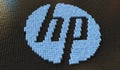 Plastic toy blocks compose logo of HP, editorial conceptual 3d rendering