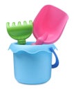 Plastic toy bucket with shovel and rake on white Royalty Free Stock Photo