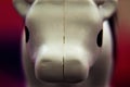 Plastic toy cow in a large approximation Royalty Free Stock Photo