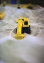 Plastic toy digger Royalty Free Stock Photo