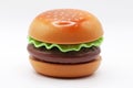 a plastic toy hamburger on a white background Royalty Free Stock Photo