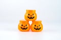 Plastic toy jack-o-lantern pumpkin for halloween decoration isolated on white background Royalty Free Stock Photo