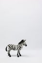 plastic toy zebra on white Royalty Free Stock Photo