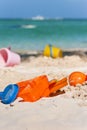 Plastic Toys at caribbean beach. Royalty Free Stock Photo