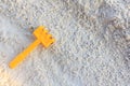 Plastic toys sand on the sea beach background. Royalty Free Stock Photo