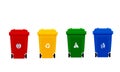 Plastic trash bin, red, yellow, green and blue four color trash bin with symbol, the front image of all four plastic waste bins Royalty Free Stock Photo