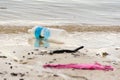 plastic trash garbage on the bay walk polluting the ocean and en