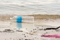 plastic trash garbage on the bay walk polluting the ocean and en