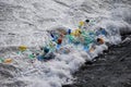 Plastic trash trapped at waterfall