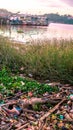Plastic trashes on the river Royalty Free Stock Photo