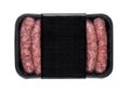 Plastic tray of raw pork beef sausages isolated Royalty Free Stock Photo