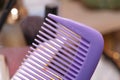Plastic violet Hair Comb made in Italy close shot Royalty Free Stock Photo