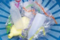 Plastic waste, Plastic bottles with straws in waste basket Royalty Free Stock Photo