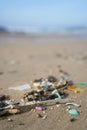 Plastic waste and micro plastic washed on the shore of the atlantic ocean