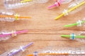 Plastic waste, Plastic bottles with straws on wooden background Royalty Free Stock Photo