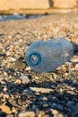Plastic water bottle on a beach Royalty Free Stock Photo