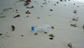Plastic water bottle garbage on beautiful beach Royalty Free Stock Photo