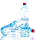 Plastic water bottles with a glass Royalty Free Stock Photo