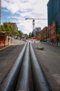 Plastic water supply pipes prepared for laying underground. Preparation for construction work on the central water supply