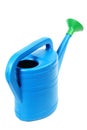 Plastic watering can isolated on a white Royalty Free Stock Photo