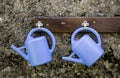 Plastic watering cans Royalty Free Stock Photo