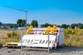 Plastic white-red barrier boards with orange warning lights in construction site Royalty Free Stock Photo