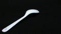 Plastic white spoon isolated Royalty Free Stock Photo