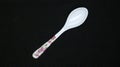 Plastic white spoon isolated Royalty Free Stock Photo