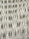 Plastic white wicker texture on laundry basket as clothing container, closeup on the pattern Royalty Free Stock Photo