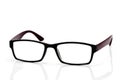 Plastic and wooden rimmed eyeglasses Royalty Free Stock Photo