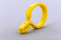 Plastic yellow clothes pin