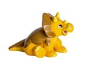 Plastic yellow dinosaur toy, Triceratops.
