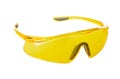 Plastic yellow safety goggles for work isolated on white background Royalty Free Stock Photo