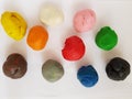 plasticine balls in various colors, background and texture