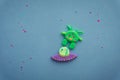 Plasticine 3D UFO, spaceship sculpture, cute green alien on starry background