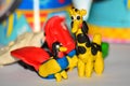 Plasticine giraffe and a rooster