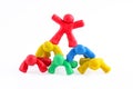 Plasticine guys making a human pyramid Royalty Free Stock Photo