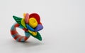 Plasticine Hand Made Flowers. Flowers made of clay isolated on w