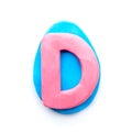 Plasticine letter D in the shape of an Easter egg