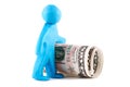 Plasticine man with banknote Royalty Free Stock Photo