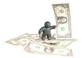 Plasticine man with one dollar banknote Royalty Free Stock Photo