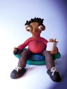 Plasticine man watching TV Royalty Free Stock Photo