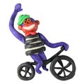 Plasticine monkey on the bicycle Royalty Free Stock Photo