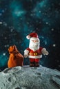 Plasticine Santa Claus with a bag of gifts on the moon