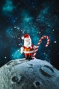 Plasticine Santa Claus with a lollipop on the moon