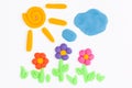 Plasticine sun, sky, cloud and flower. Royalty Free Stock Photo