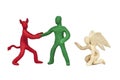 Plasticine victory of evil over good is isolated on a white background Royalty Free Stock Photo