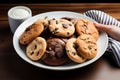 A plate adorned with a tempting assortment of freshly baked chocolate cookies