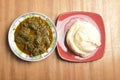 A plate of Afang soup and Fufu