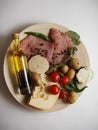 Plate of appetite meat and various vegetables